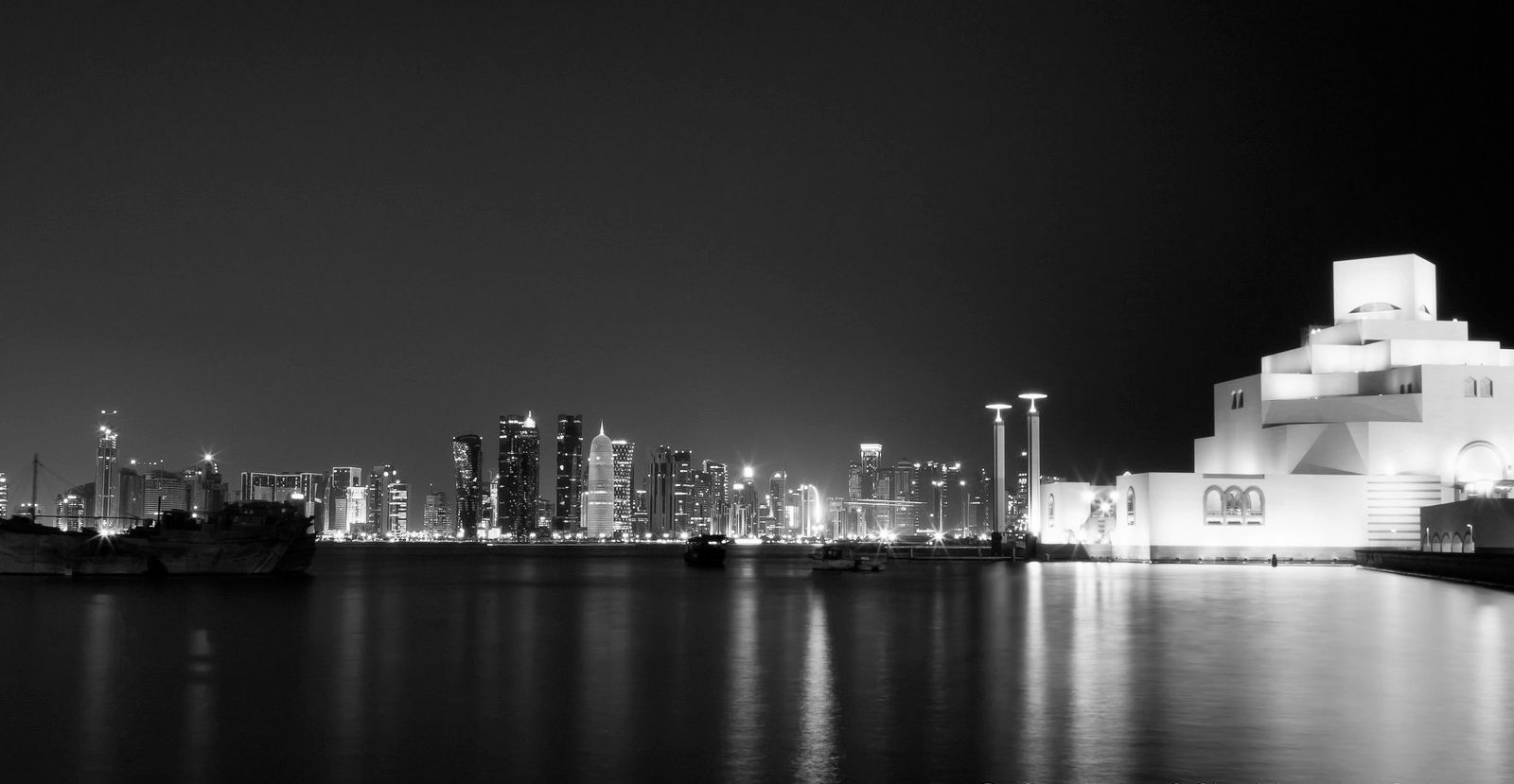 Doha at night: the Museum of Islamic Art and the West Bay skyline